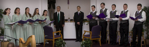 The Bridal Party singing together while Flower Girl and Bible Boy enter, and while Bride enters.
